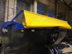 Tarpaulin cover for sand spreader on wheels